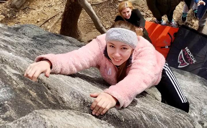 Image of Student Rock Climbing